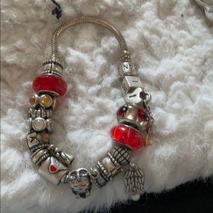 Pandora bracelet as shown with charms